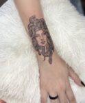 Medusa Hand Tattoo