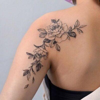 Women's flower shoulder tattoos.