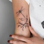 Dragonfly lotus tattoo