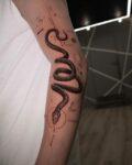Geometric snake tattoos